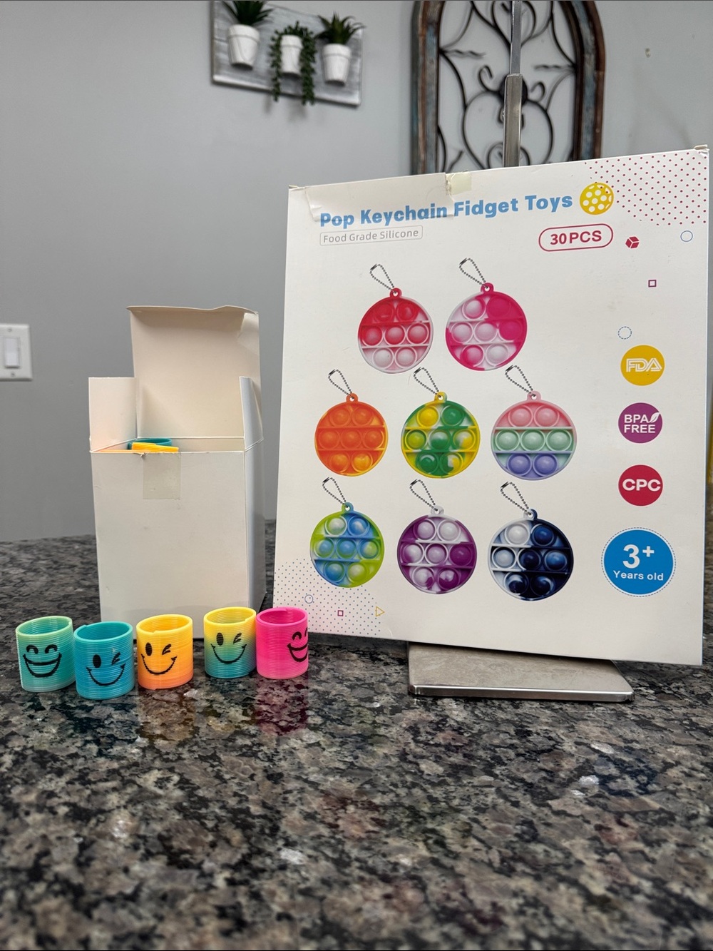 Pop Keychain Fidget Toys Set and slinkies Colorful Assorted Smiley Spring Toys